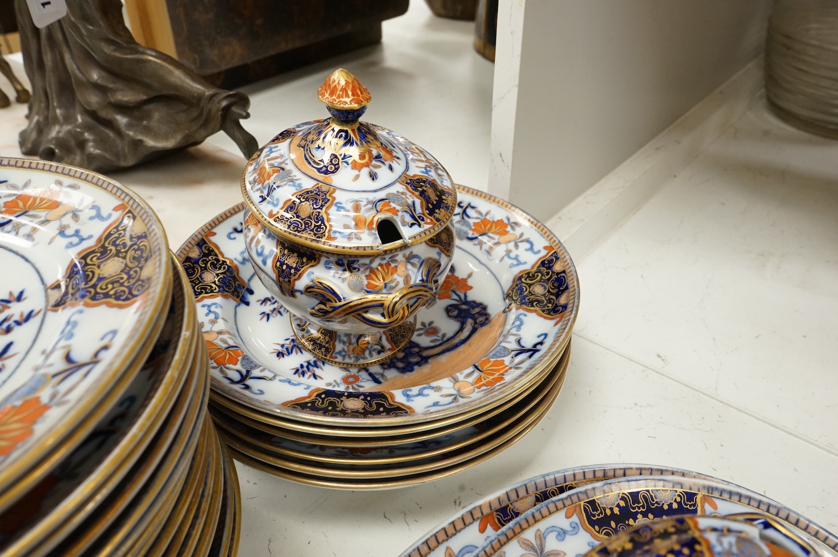 A Victorian Davenport dinner service to include tureens, dinner plates and soup bowls, largest 52cm wide